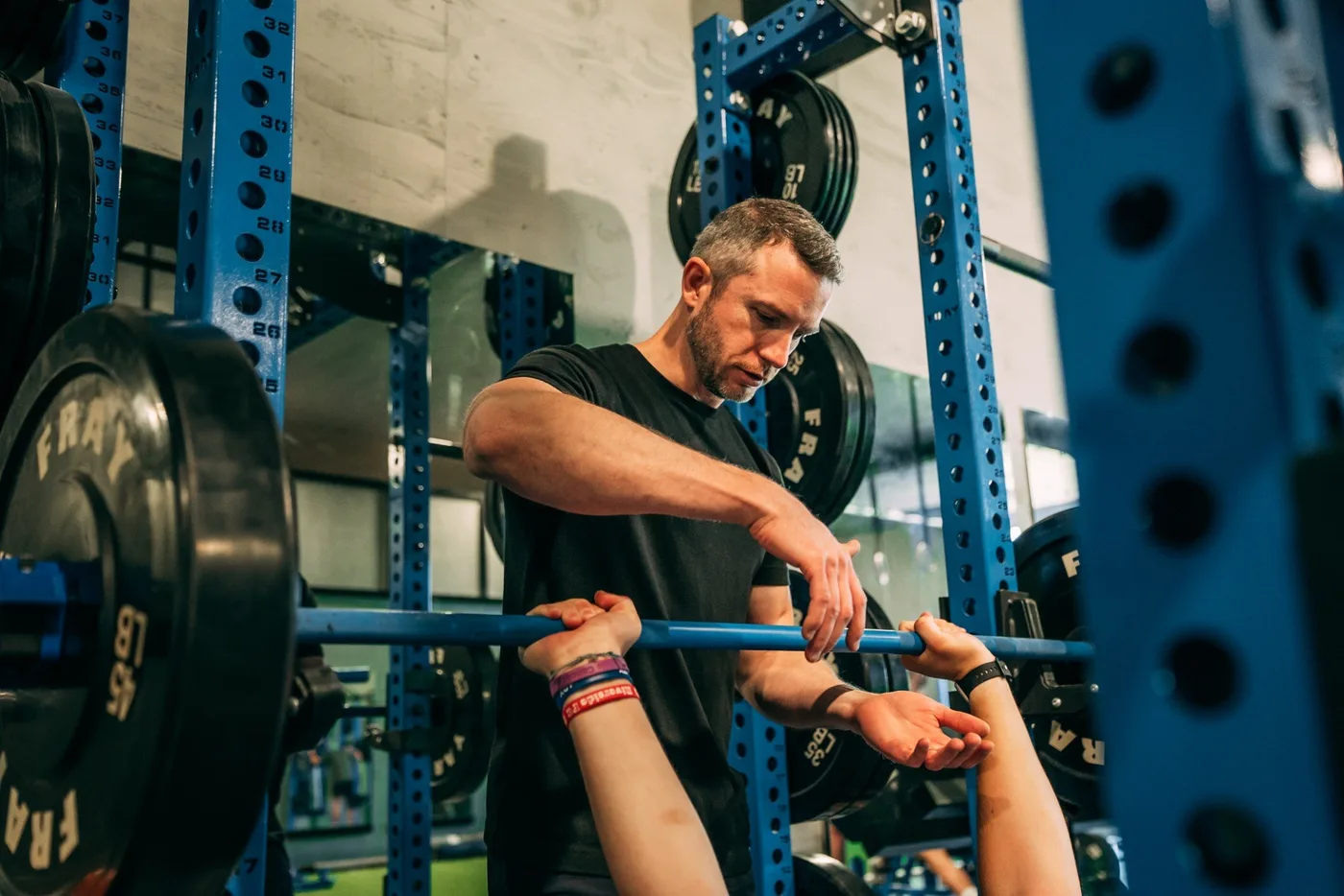 Coach Cody Frey coaching barbell technique — FPC Performance Coaching