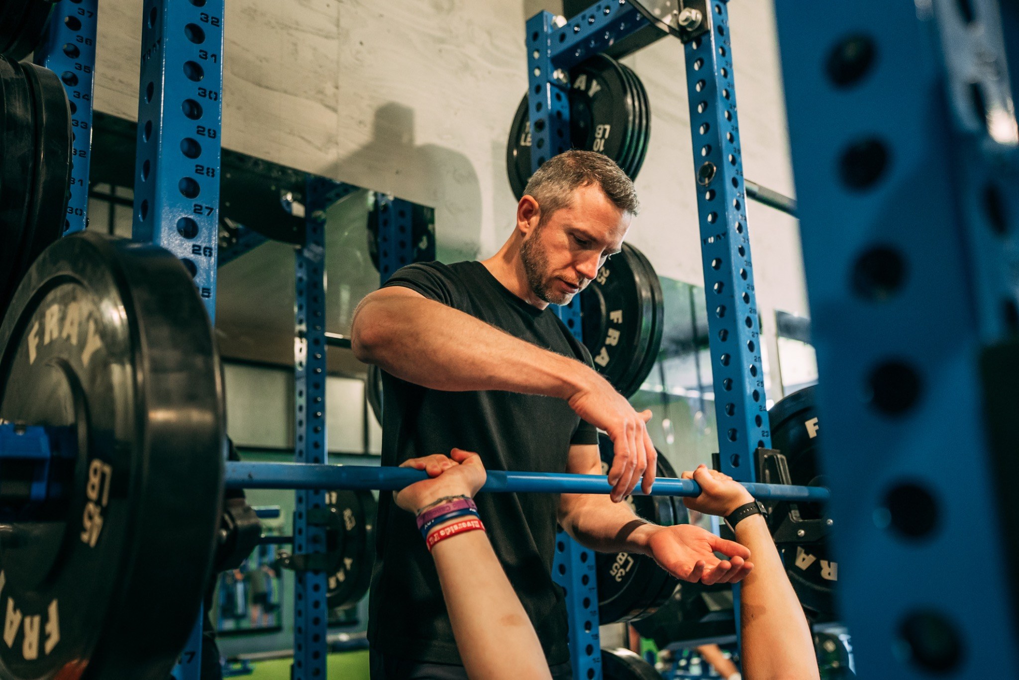 Athlete pushing sled at Frey Performance Coaching